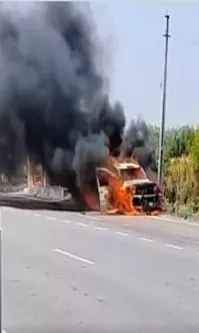 Car Catches Fire On Road At Medak highway burning